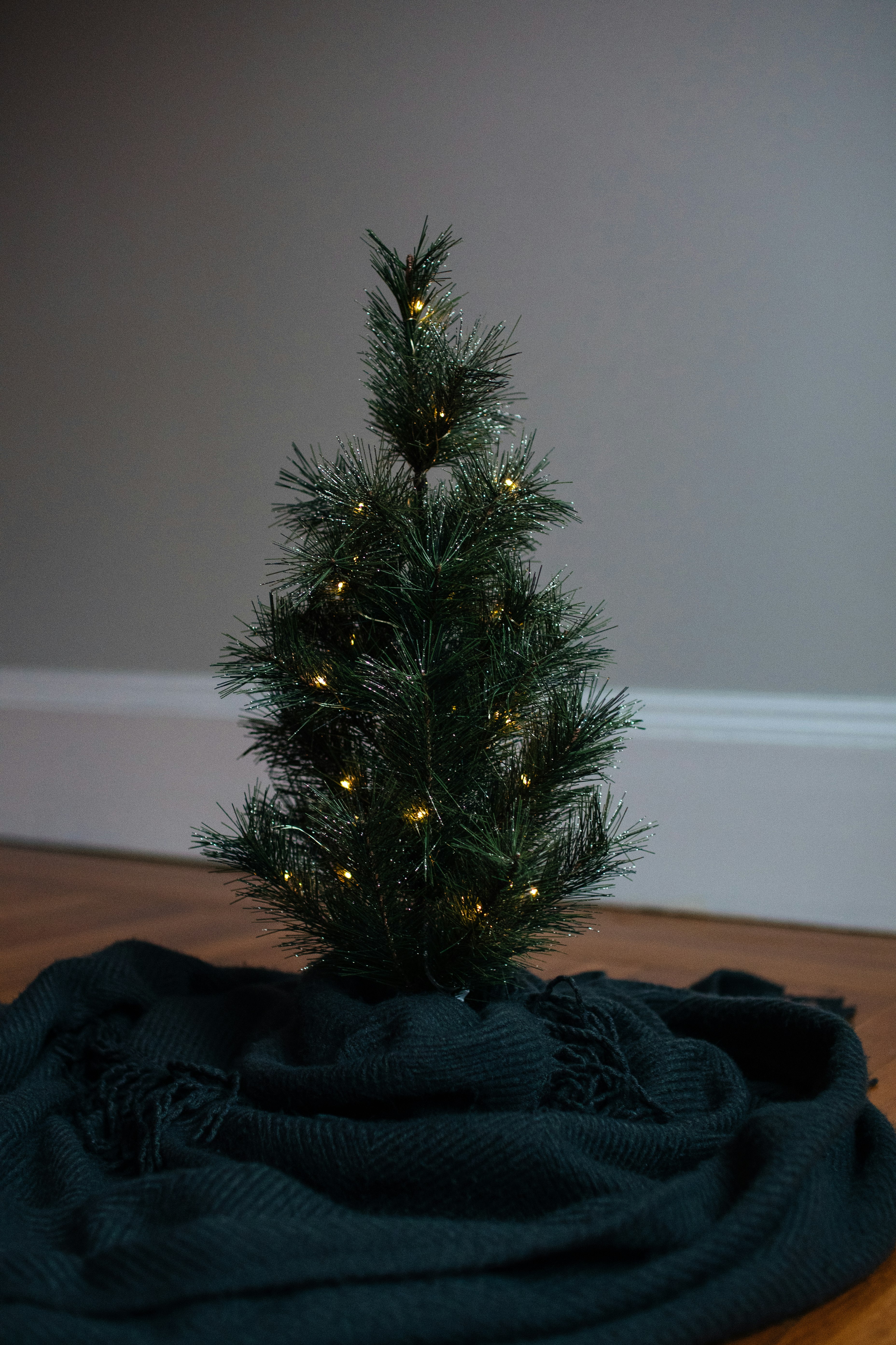 green christmas tree with string lights